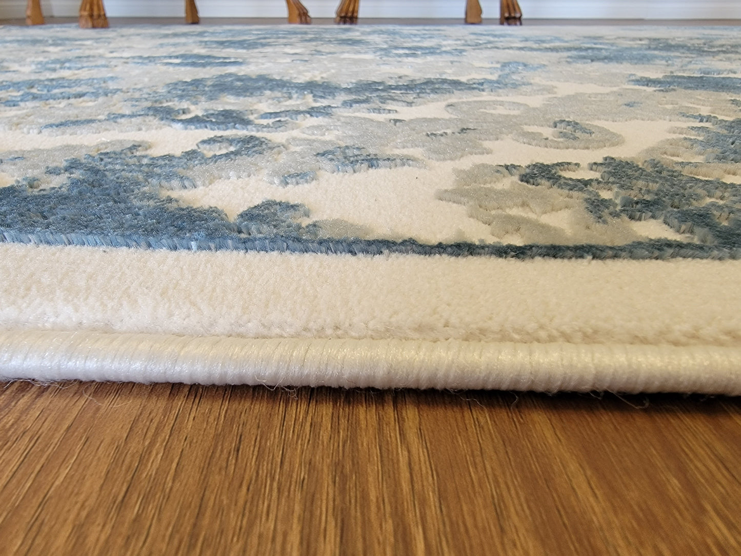 Airmont Damask Area Rug. Eggshell, Off-White, and Navy