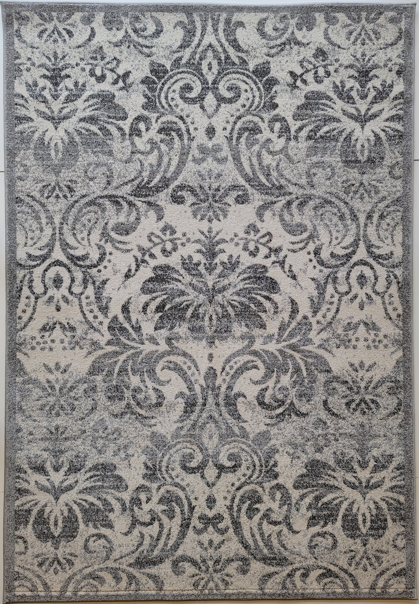 Chester Floral Area Rug. White and Dark Gray