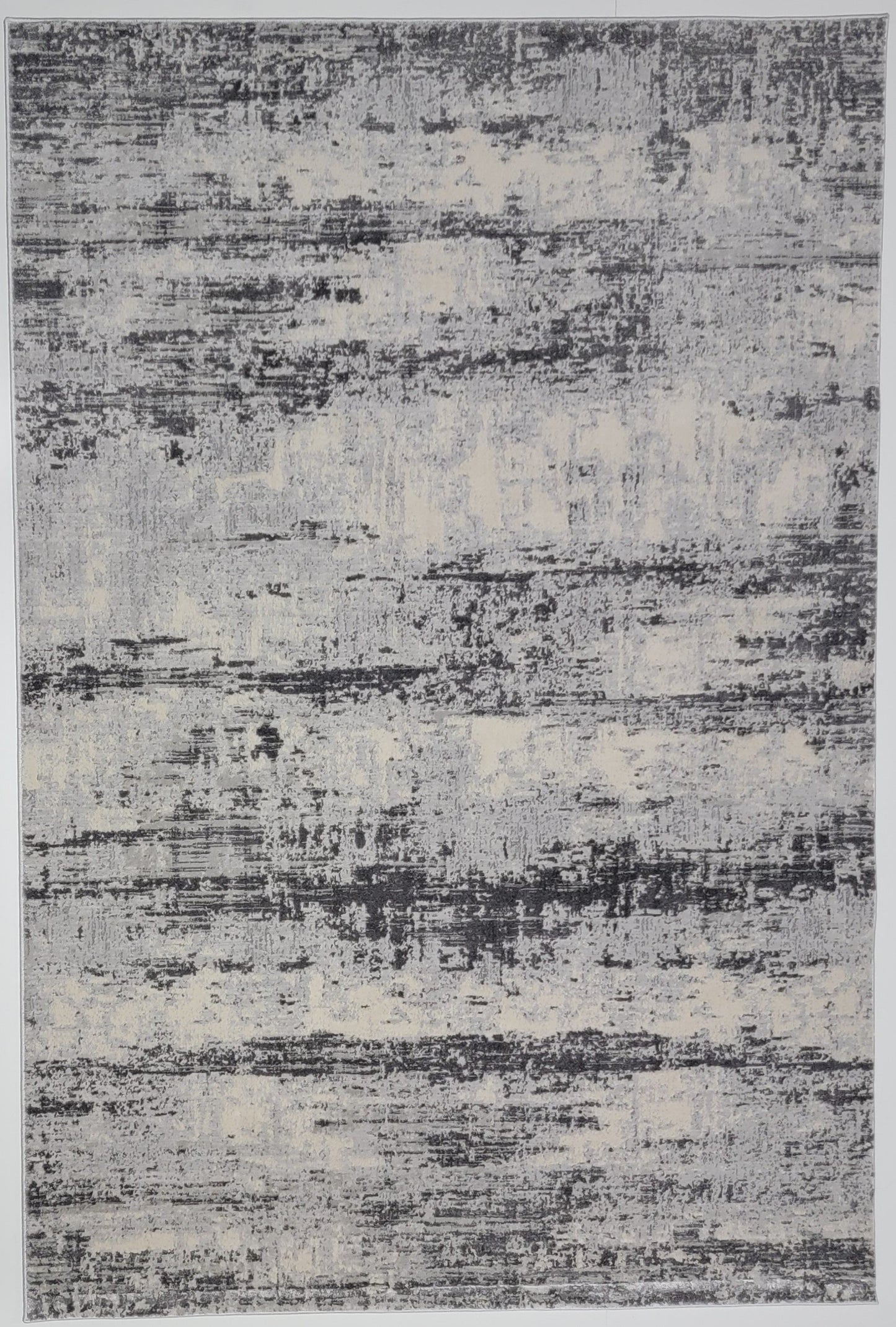 Cozy Abstract Area Rug. Cream, Light Gray, and Slate Gray