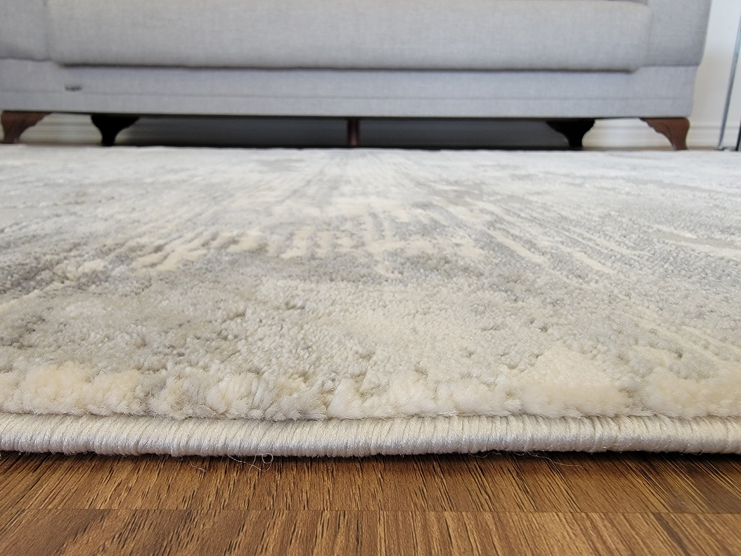 Cozy Abstract Area Rug. White, Light, and Dim Gray