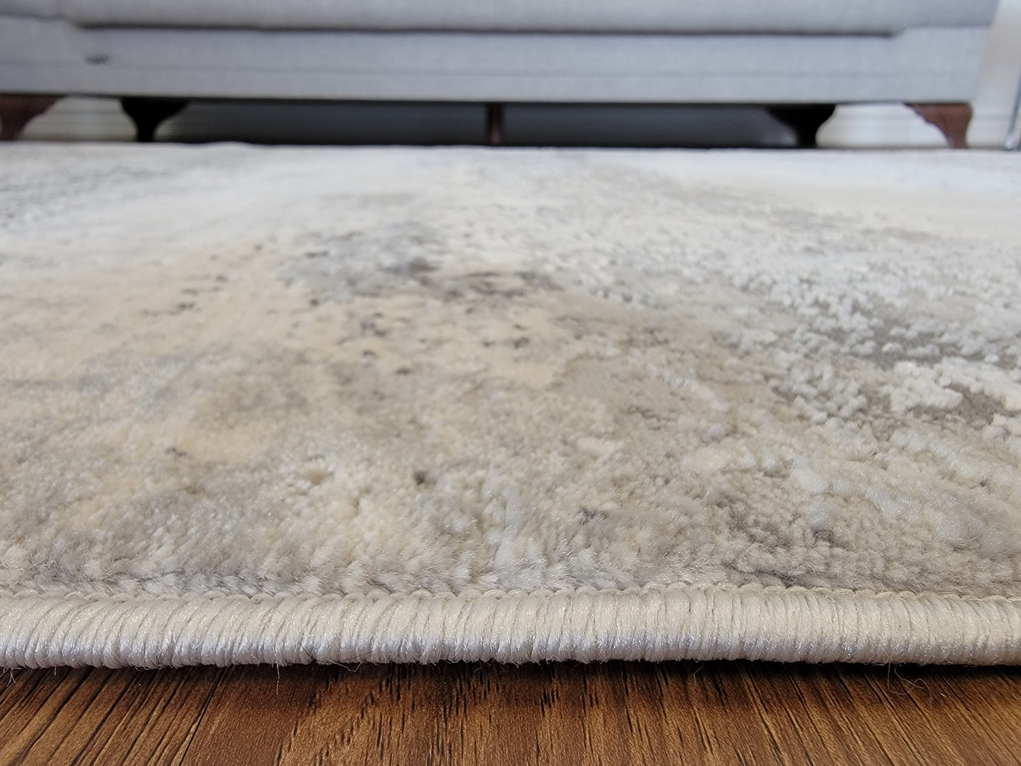 Cozy Abstract Area Rug. White, Platinum, and Slate Gray