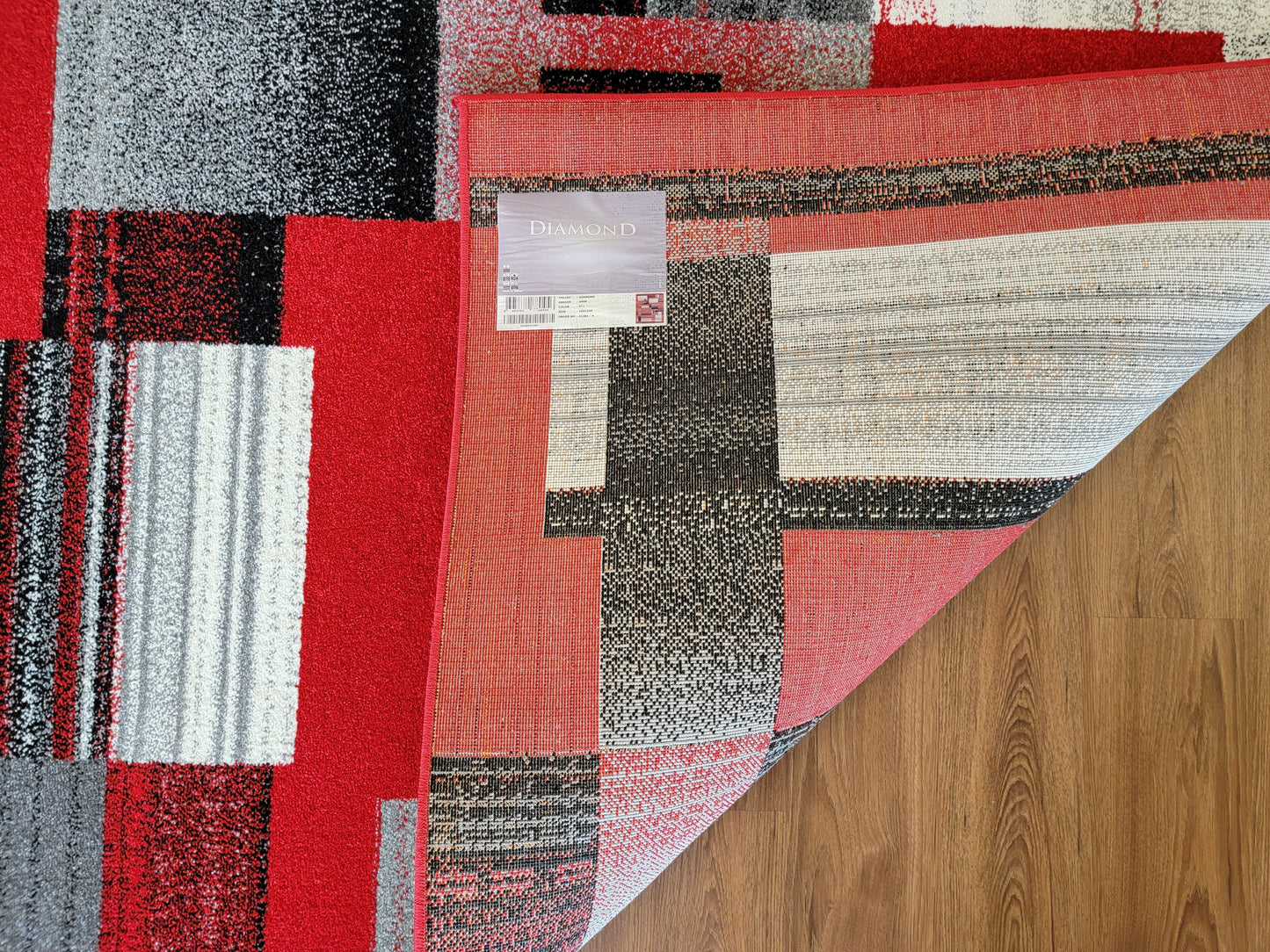 Diamond Art Geometric Area Rug. Scarlet Red, Gray, and Black