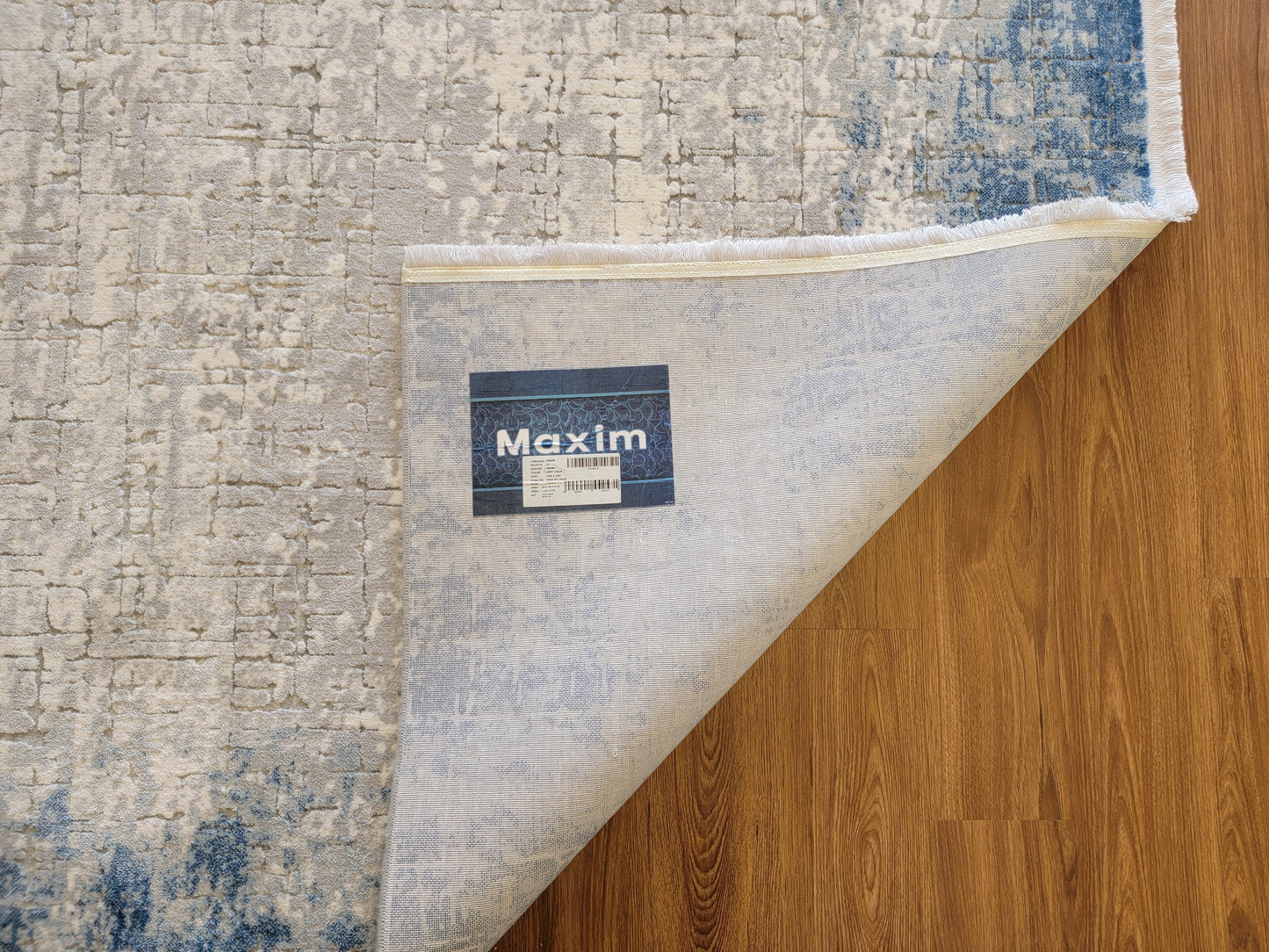 Maxim Abstract Area Rug. White, Platinum, and Cobalt Blue