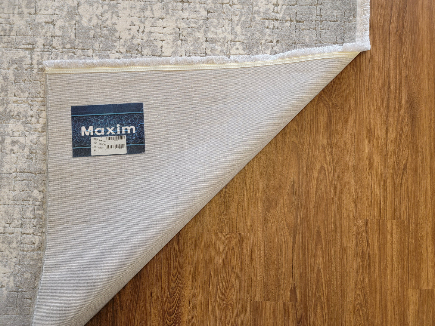 Maxim Abstract Area Rug. White, Platinum, and Ash Gray