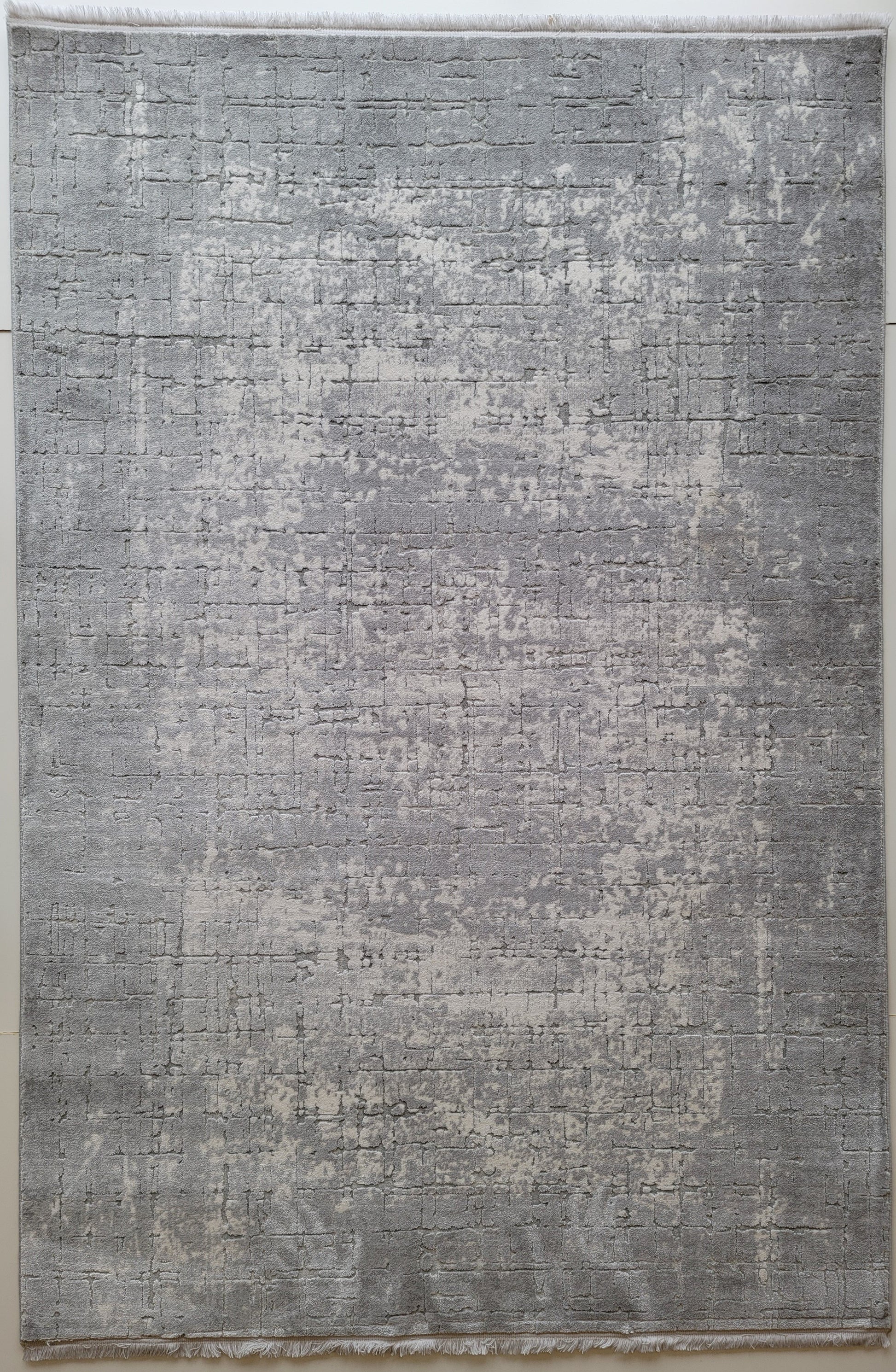 Maxim Abstract Area Rug. White, Platinum, and Ash Gray