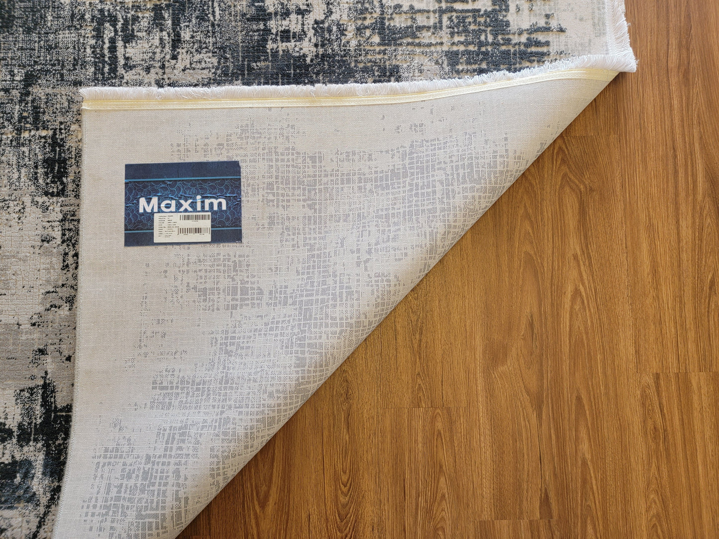 Maxim Abstract Area Rug. Light Gray, Slate Gray, and Charcoal