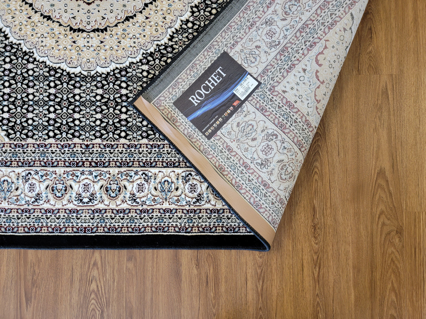 Rochet Oriental Area Rug. Black and Beige