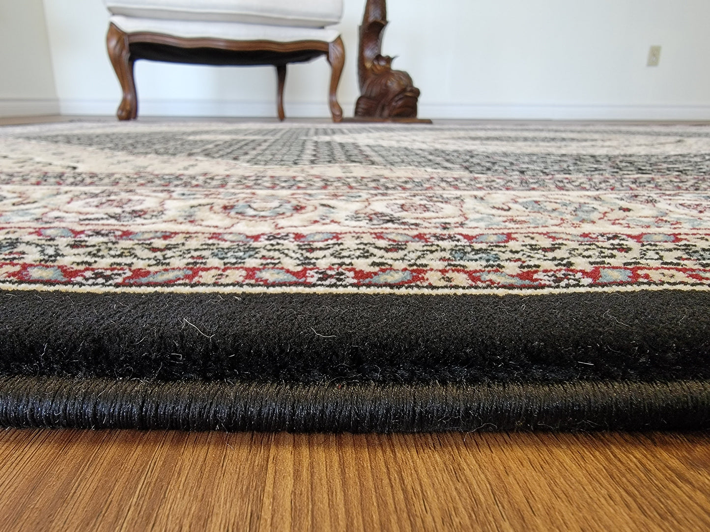 Rochet Oriental Area Rug. Black and Beige