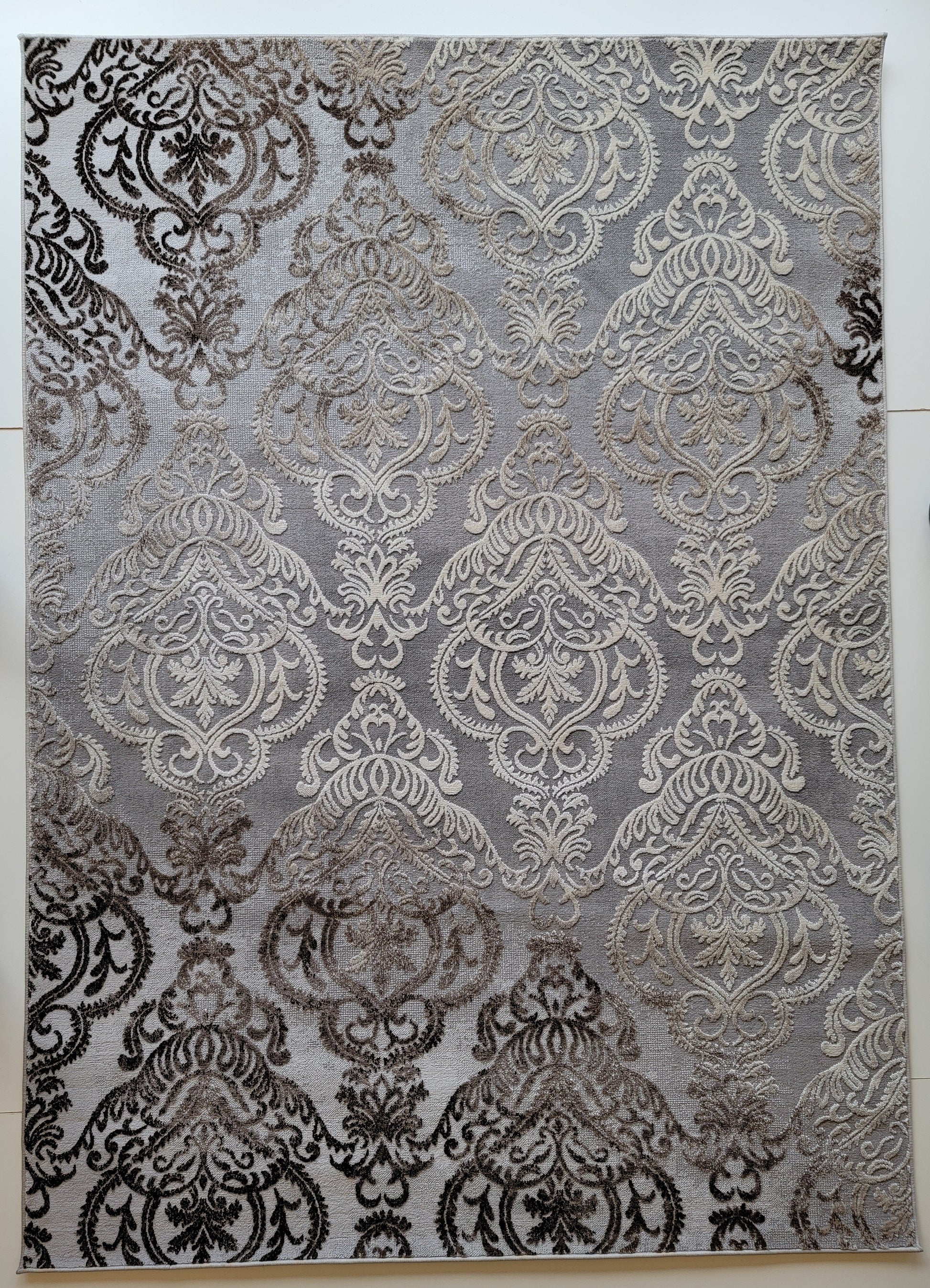 Thema Damask Area Rug. Silver, White, and Charcoal Gray