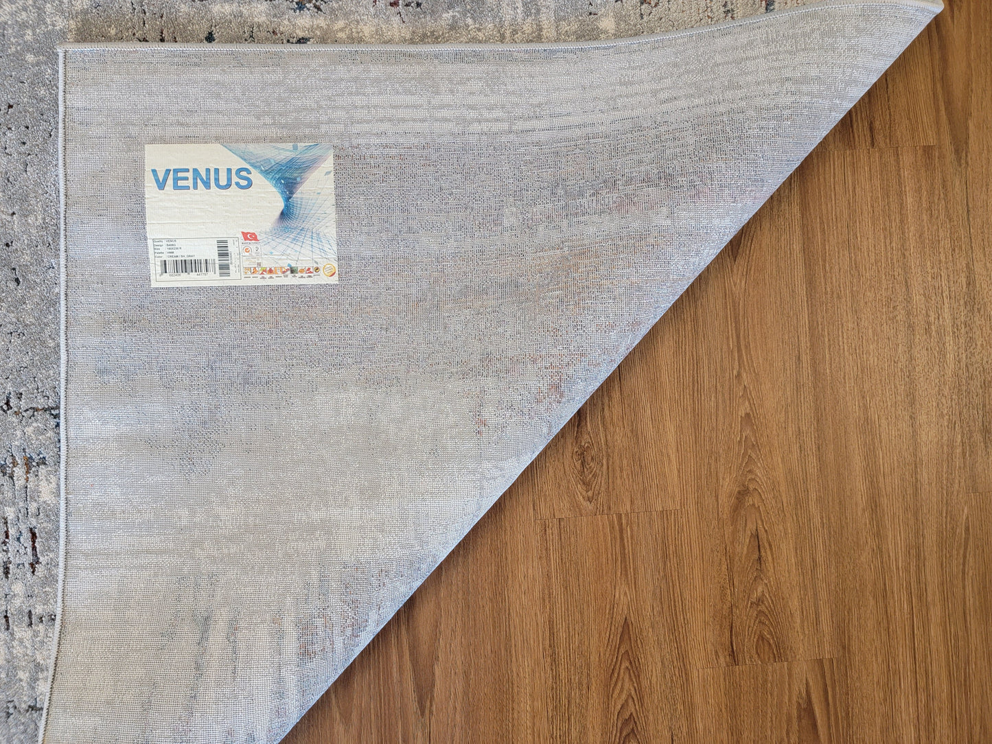 Venus Abstract Area Rug. White, Light Gray, and Blue