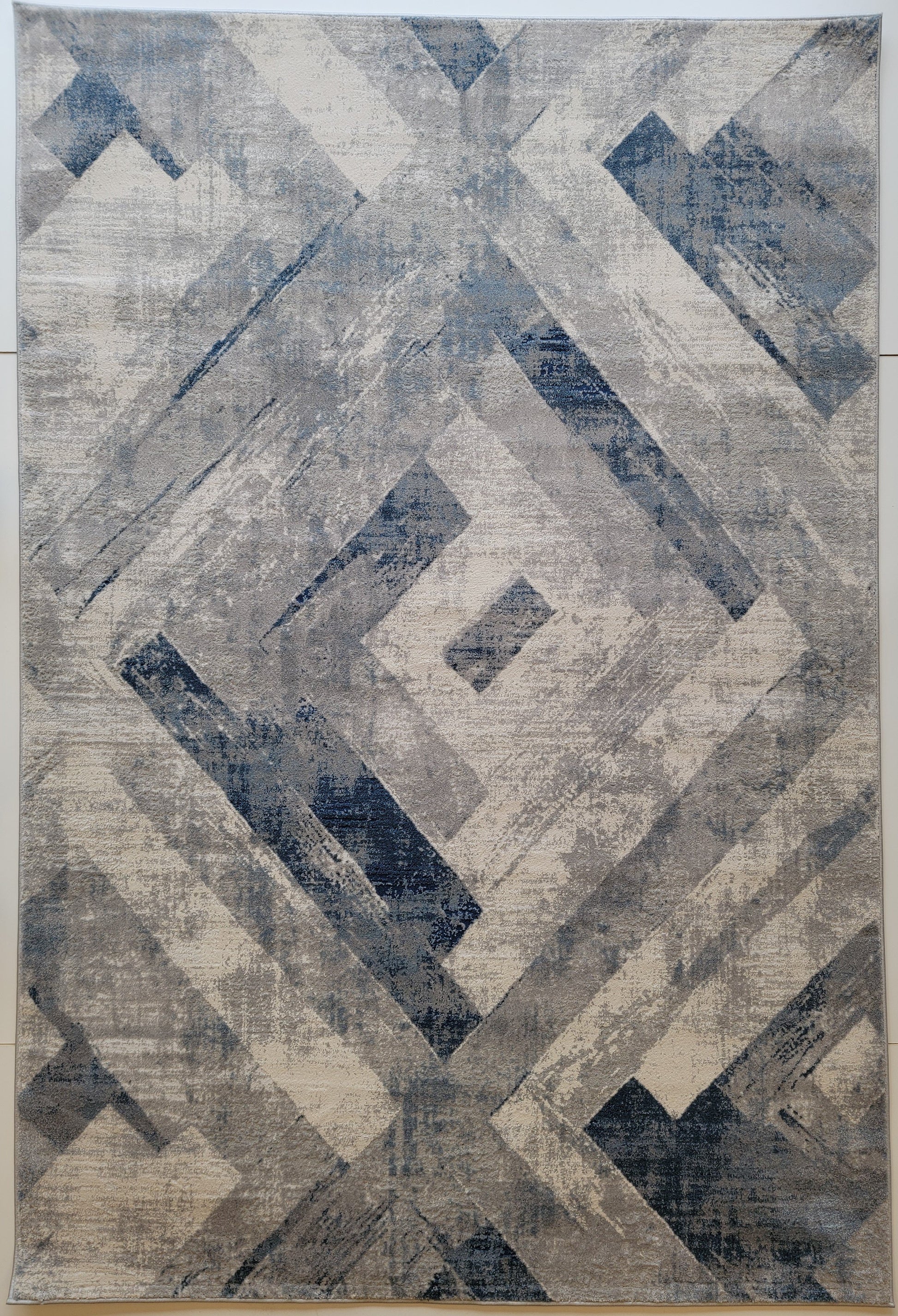 Venus Geometric Area Rug. White, Blue, and Light Gray