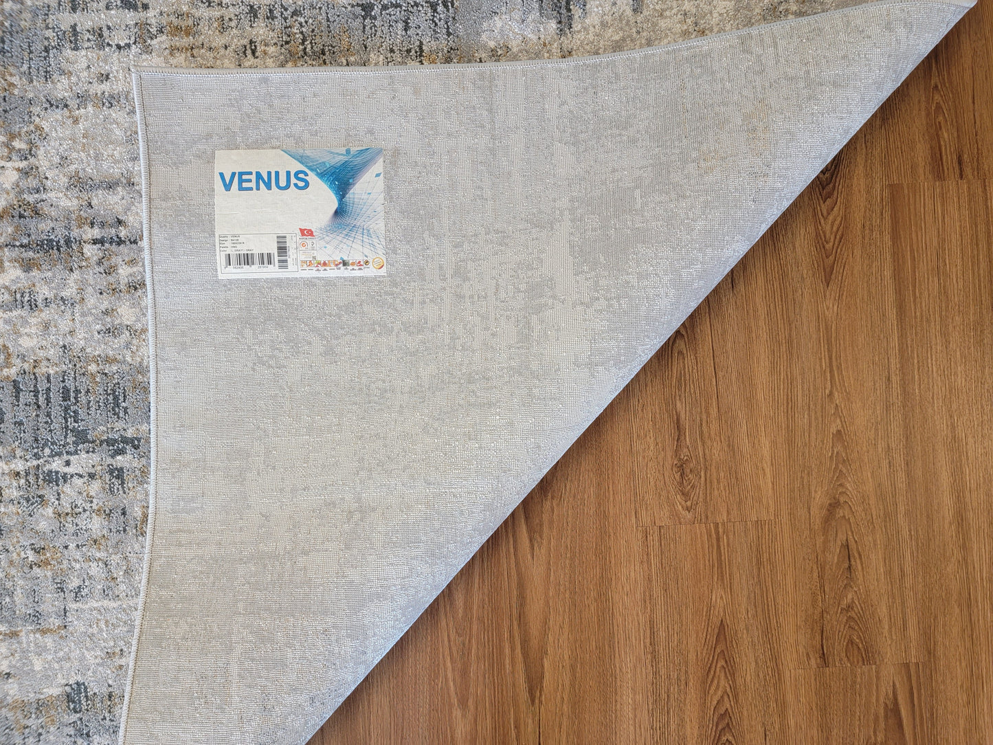 Venus Abstract Area Rug. White and Gray with Light Brown Patches