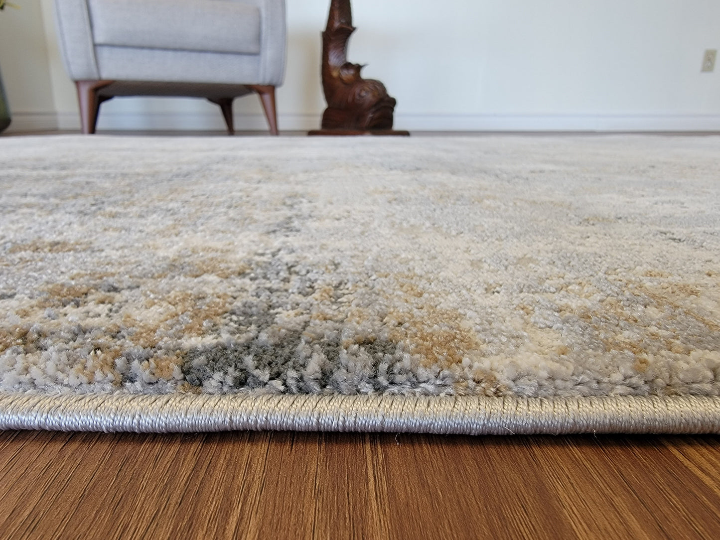 Venus Abstract Area Rug. White and Gray with Light Brown Patches