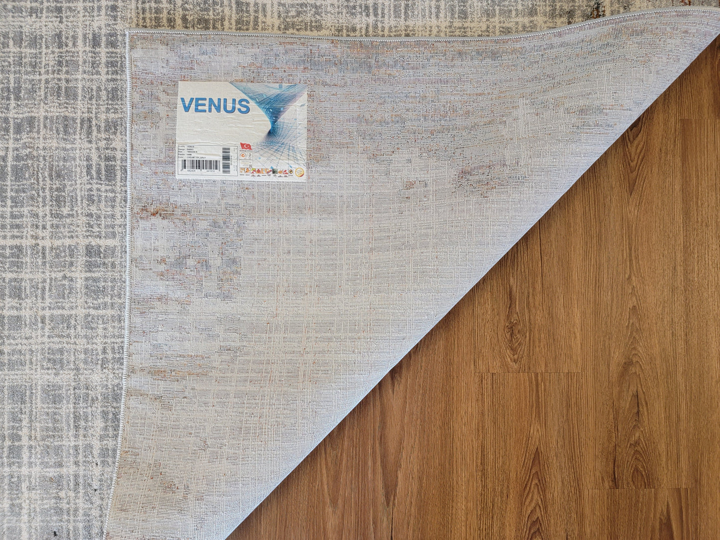 Venus Geometric Area Rug. White and Ash Gray with Patches in Copper