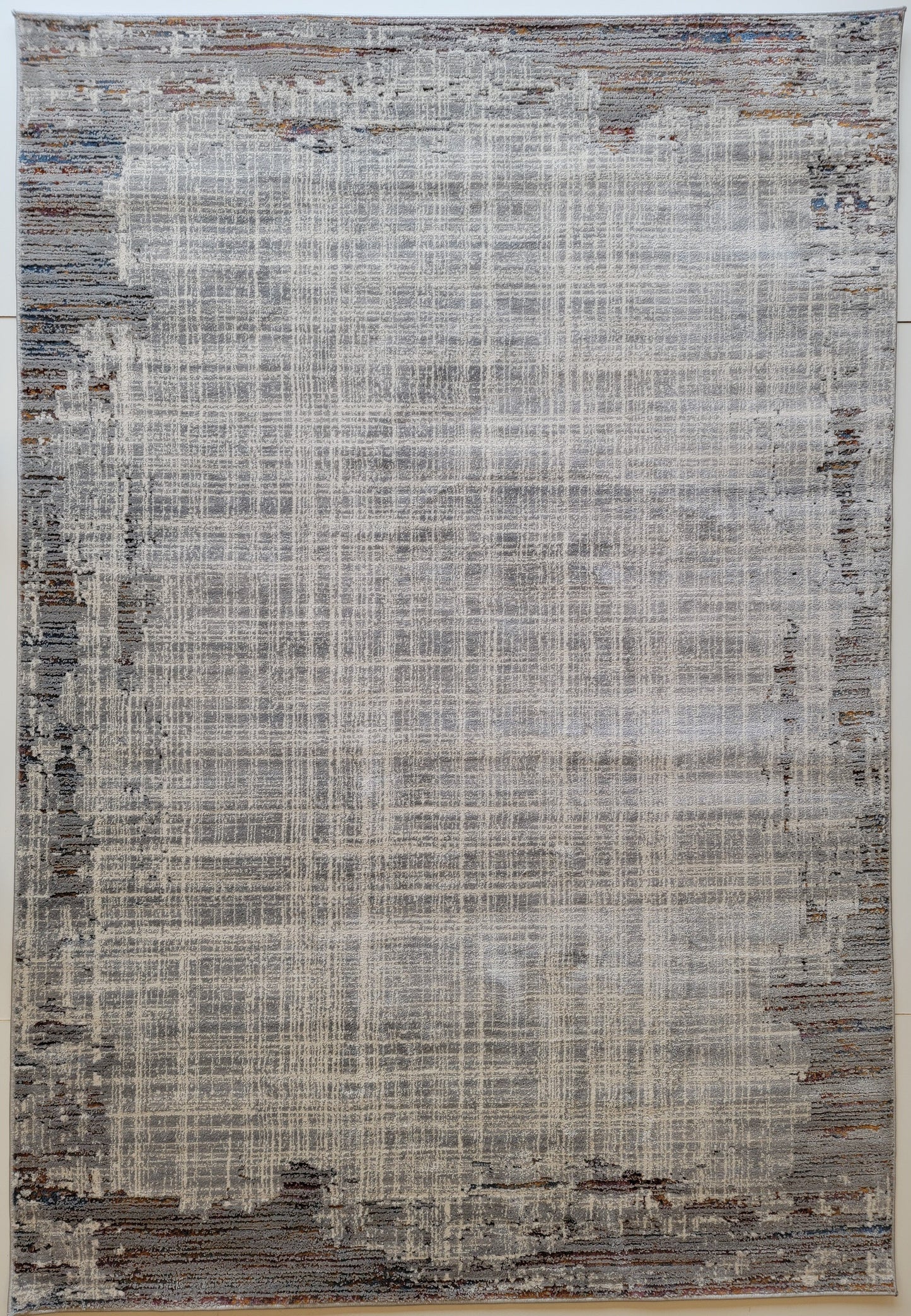 Venus Geometric Area Rug. White and Ash Gray with Patches in Copper